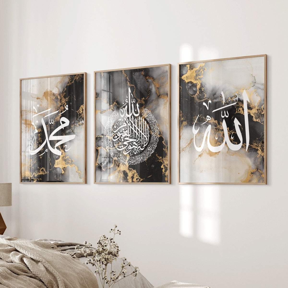 A set of three framed wall art prints featuring black and gold marble effects, with Arabic calligraphy of Allah, Ayatul Kursi, and Muhammad.