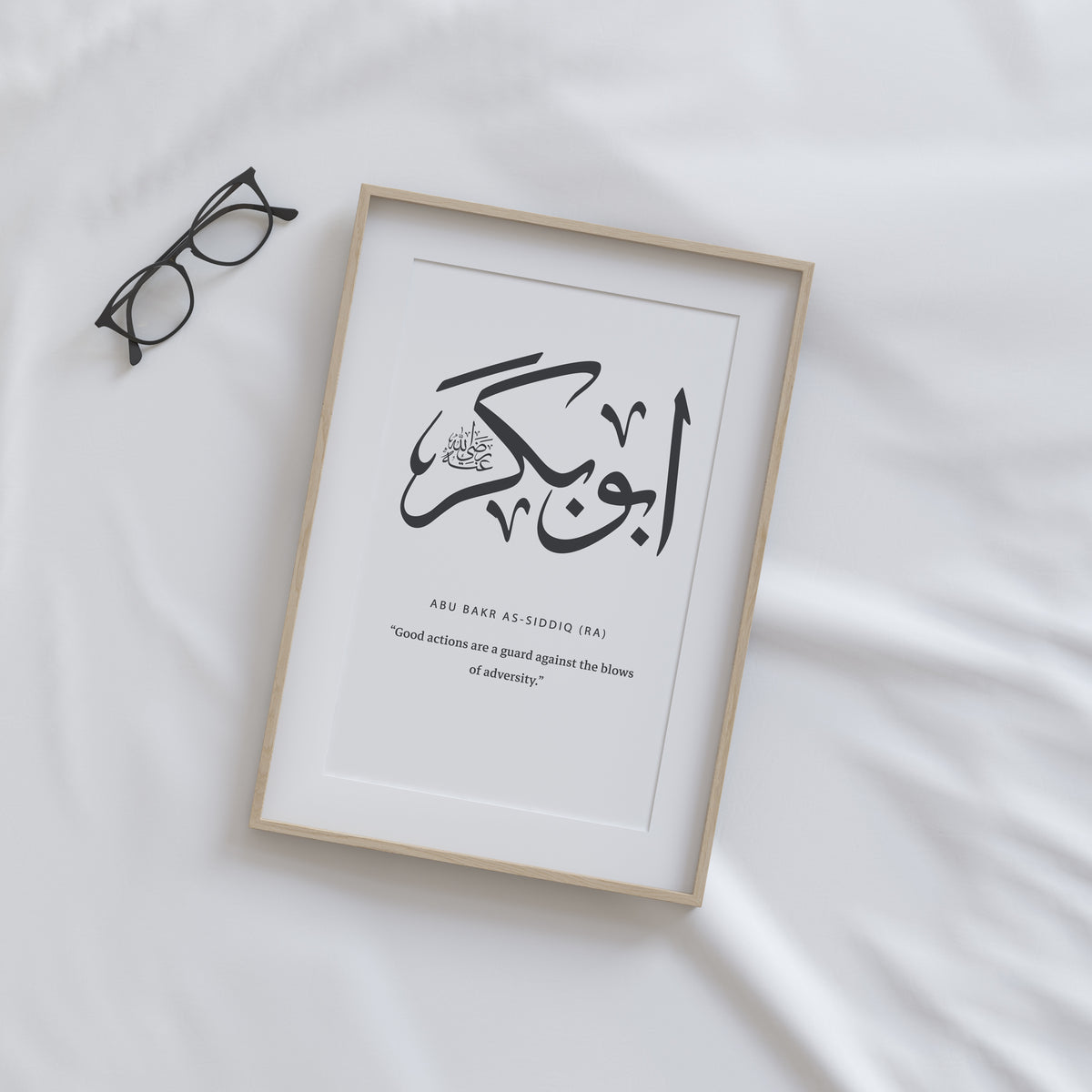 Close up Abu Bakr Arabic calligraphy print with English quote