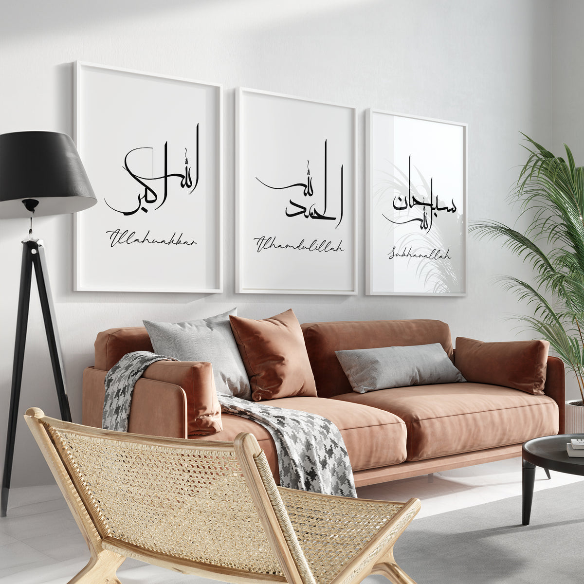 Three framed Dhikr prints in black Arabic calligraphy displayed above a terracotta sofa in a bright room.