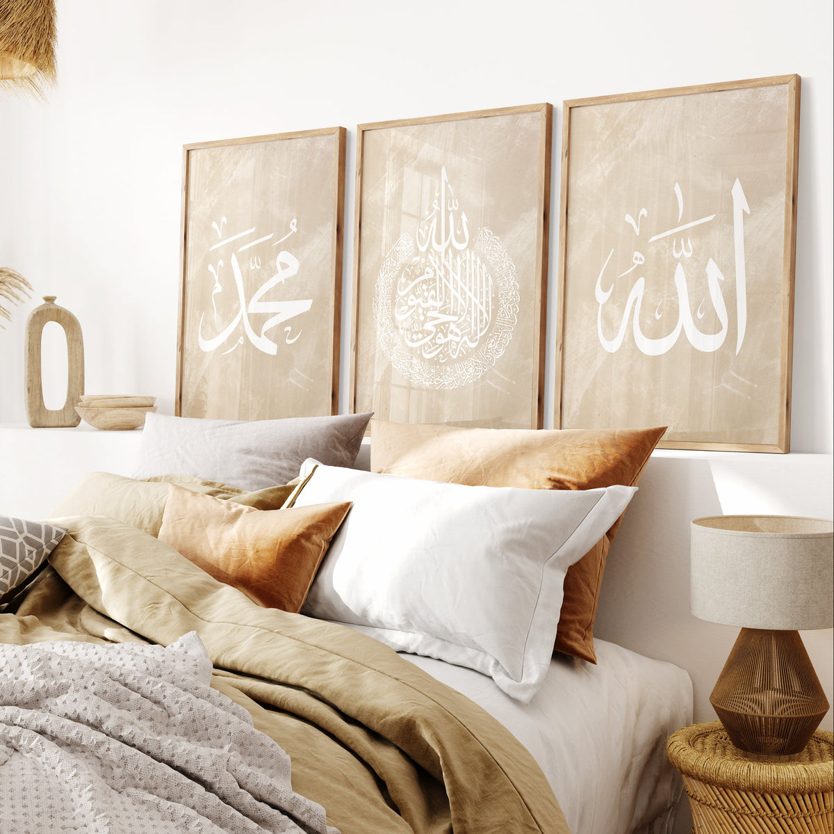 Bedroom with decorative pillows, lamp, and wall art featuring Arabic calligraphy.