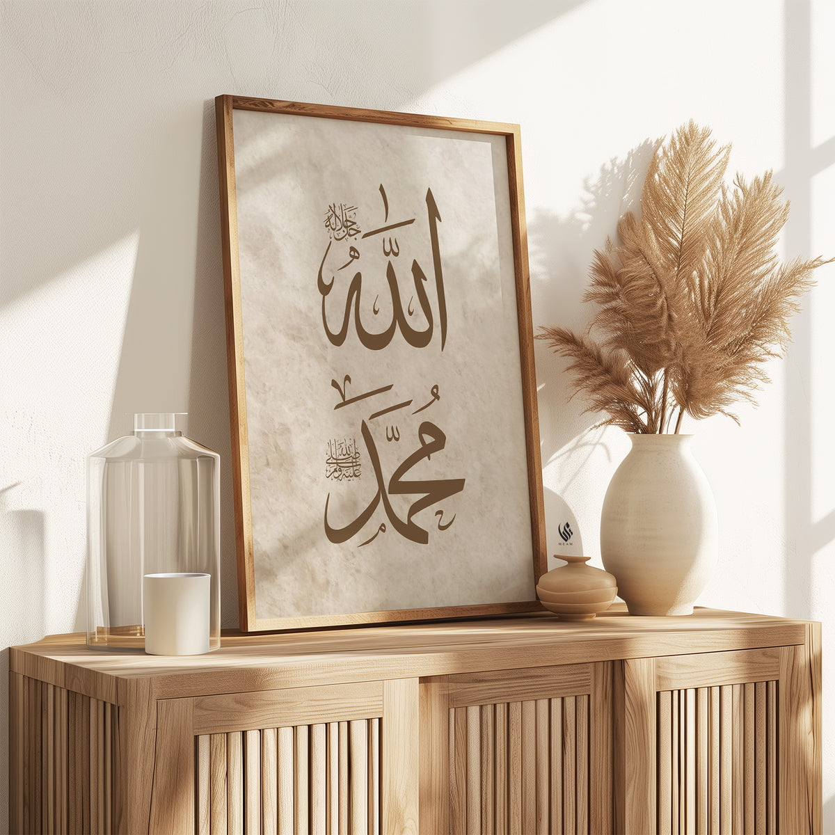 Framed Arabic calligraphy on a wooden console table with decorative items.
