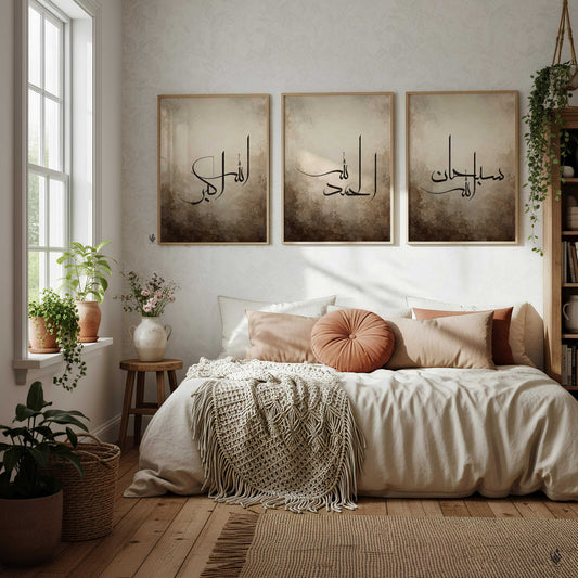 Bedroom styled with a set of 3 Islamic wall art prints above the bed, featuring SubhanAllah, Alhamdulillah and Allahu Akbar in black Arabic calligraphy.