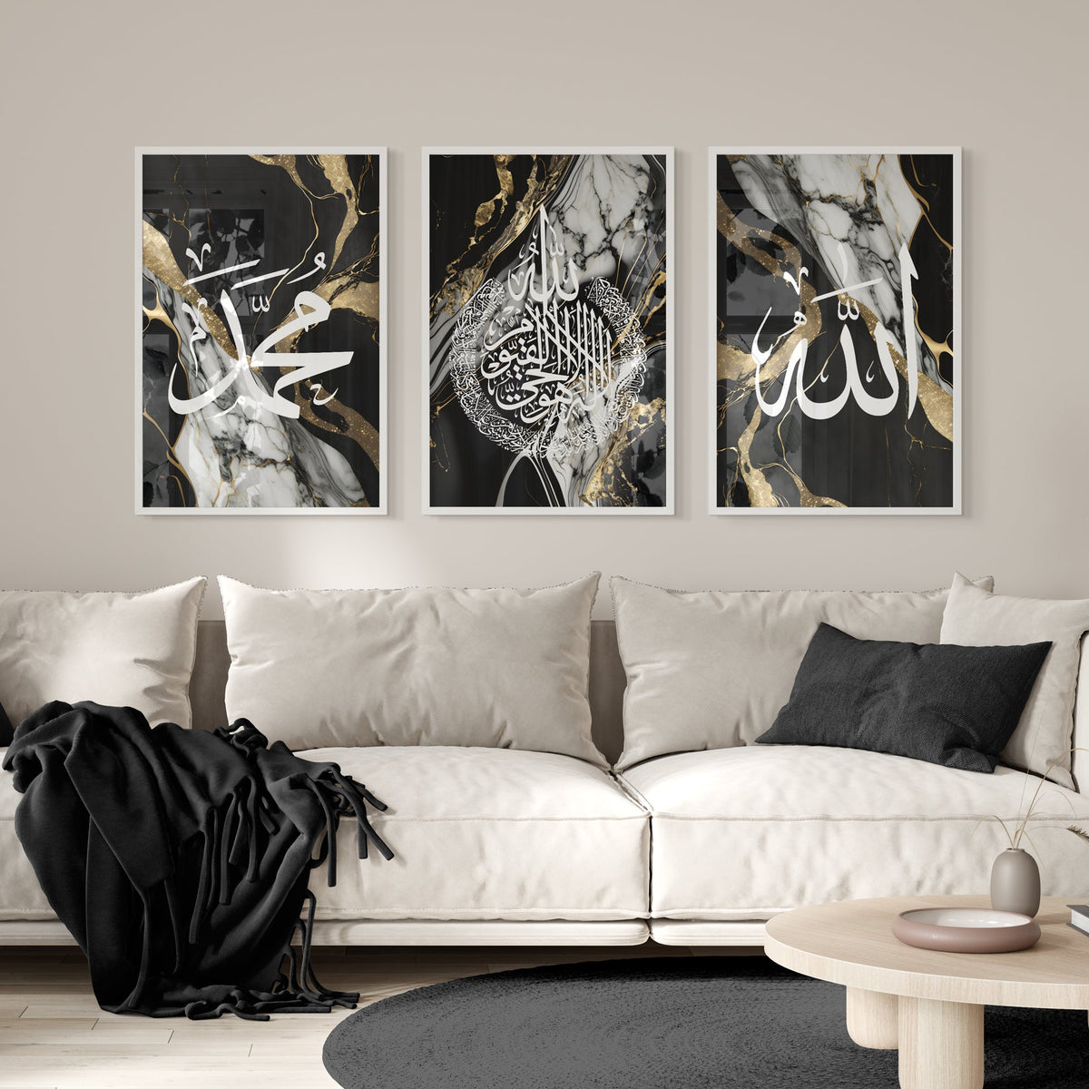 Three abstract art prints on a wall above a sofa in a living room.