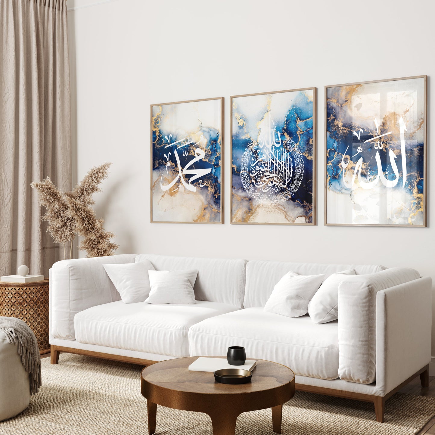 Living room with a white sofa, wooden coffee table, and abstract art on the wall.