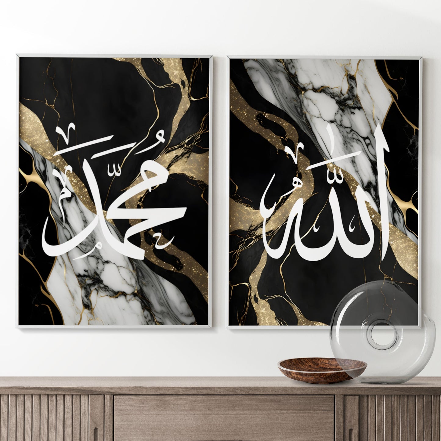 Two abstract art pieces with Arabic calligraphy on a black background, displayed above a wooden cabinet.