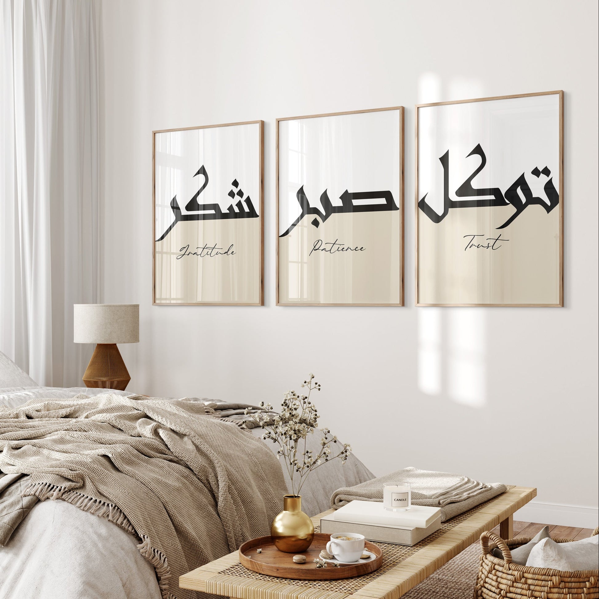 Bedroom with three framed Arabic calligraphy prints on the wall