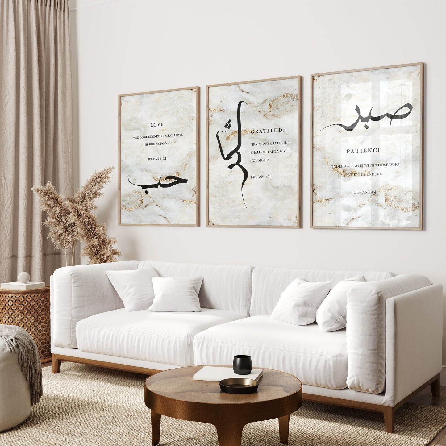 Modern living room with a white sofa, wooden coffee table, and framed artwork on the wall.