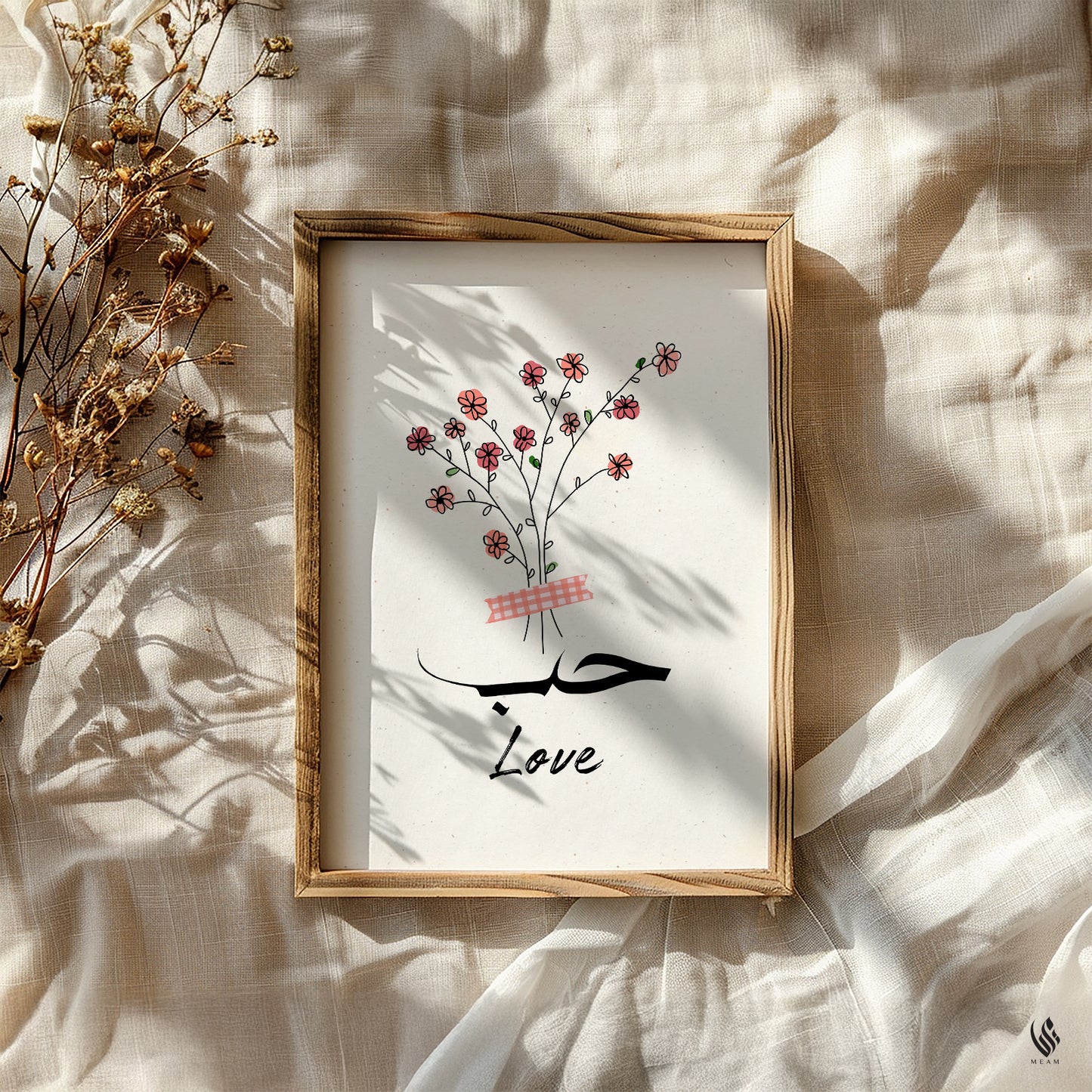 Framed artwork with floral design and Arabic calligraphy on a textured surface