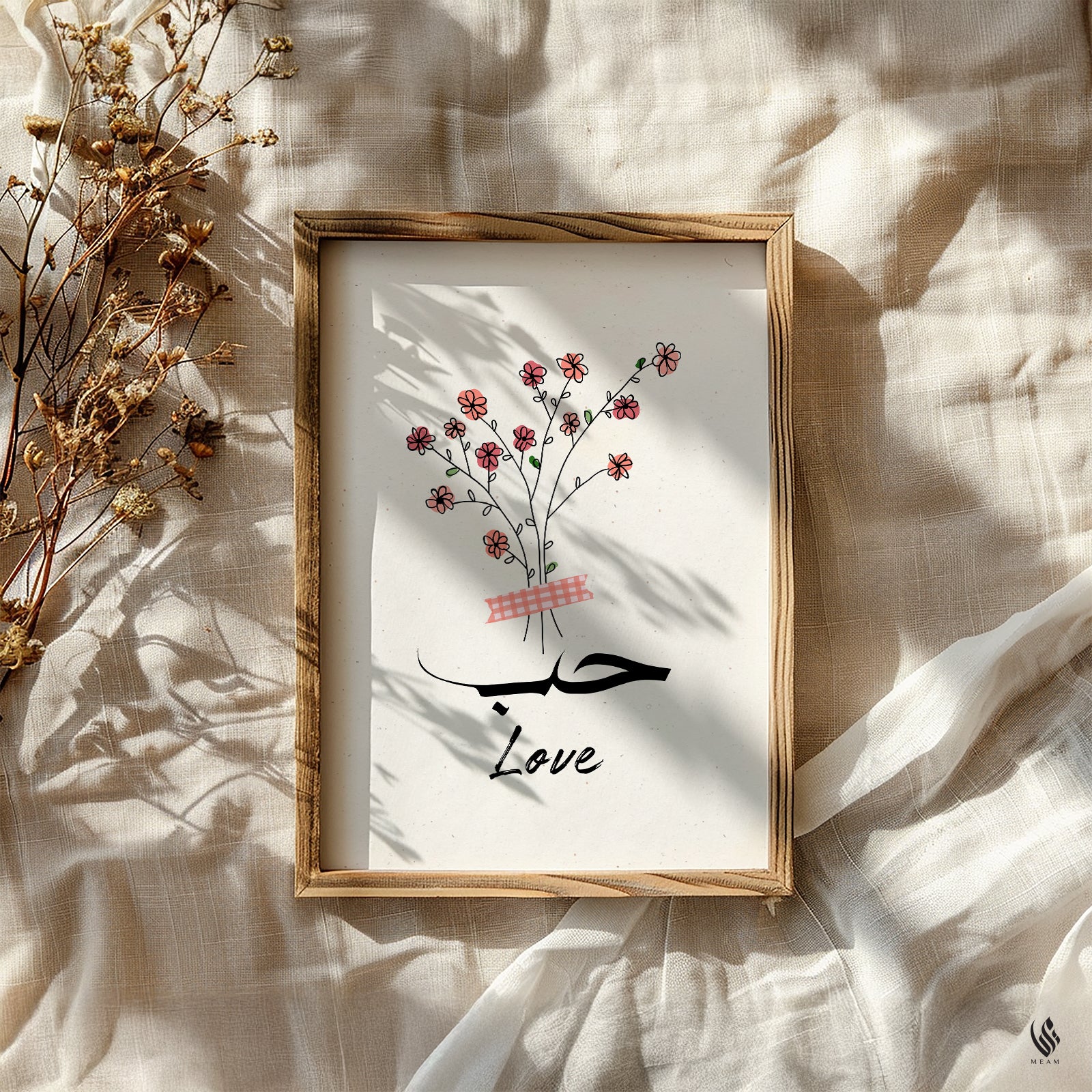 Framed artwork with floral design and Arabic calligraphy on a textured surface