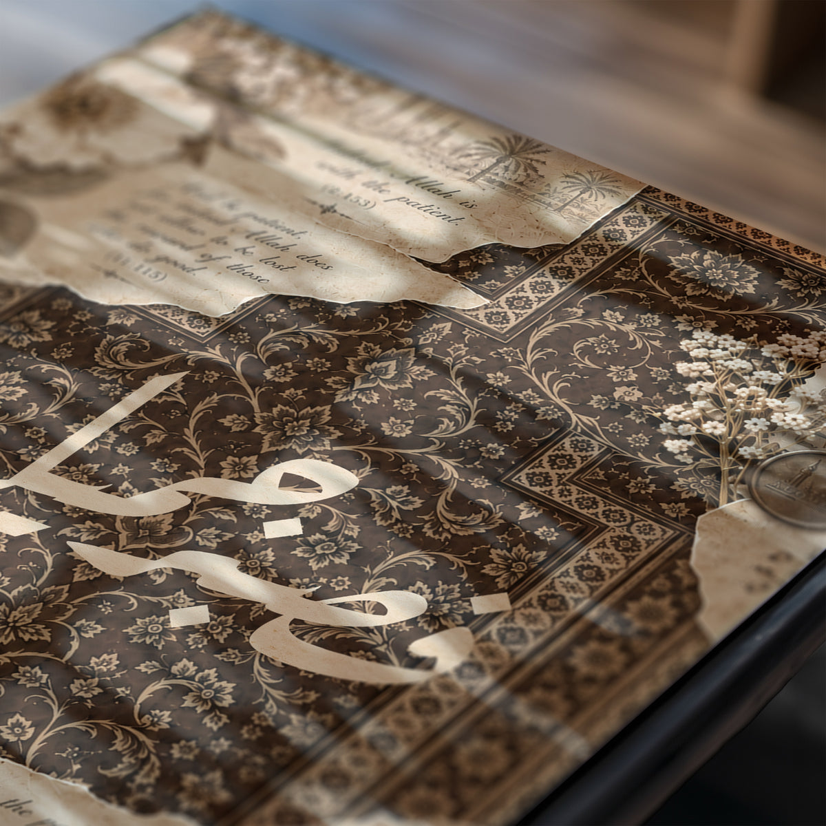 A close-up of an ornate vintage-style invitation card or booklet with Arabic calligraphy, a torn parchment element, and a dark brown floral patterned background.