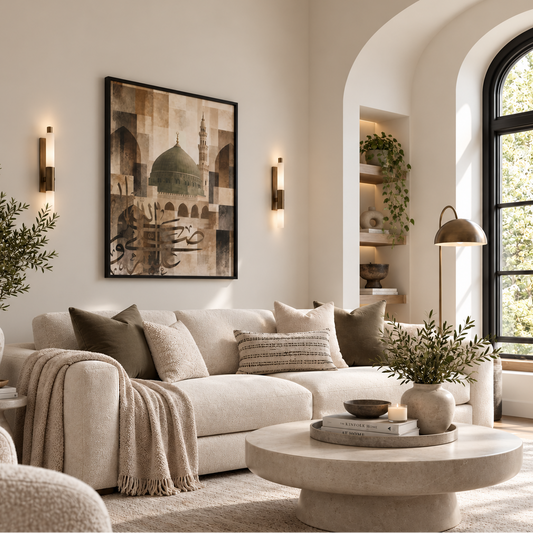 Madina mosque Islamic wall art in a black frame above a cream sofa in a bright modern neutral living room.