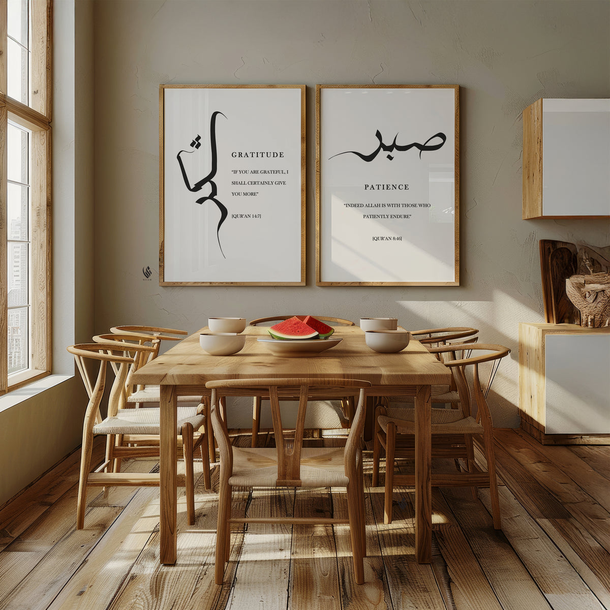 Sabr and Shukr Islamic wall art set of 2 displayed above a wooden dining table, with black Arabic calligraphy and minimalist neutral styling.
